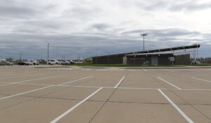 Large parking lot outside of recreational facility