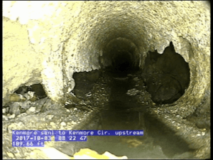 Image of a corroded sewer pipe beyond repair.