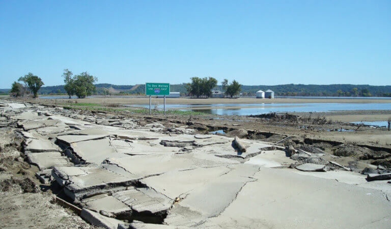 A 2011 spring flood completely destroyed the pavement of I-680 near Council Bluffs, which required emergency roadway repair to receive FHWA Emergency Relief funding.