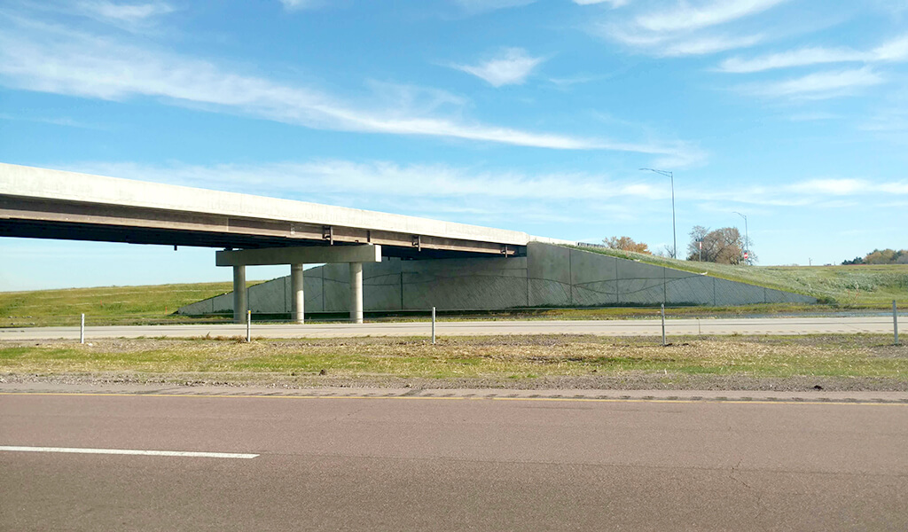 Bridge over interstate showing abutments, piers, and girders.