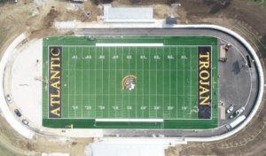 aerial view of Atlantic Trojans football field with surrounding track under construction