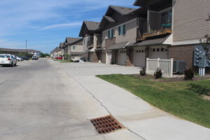 new concrete with a street drain in it for stormwater