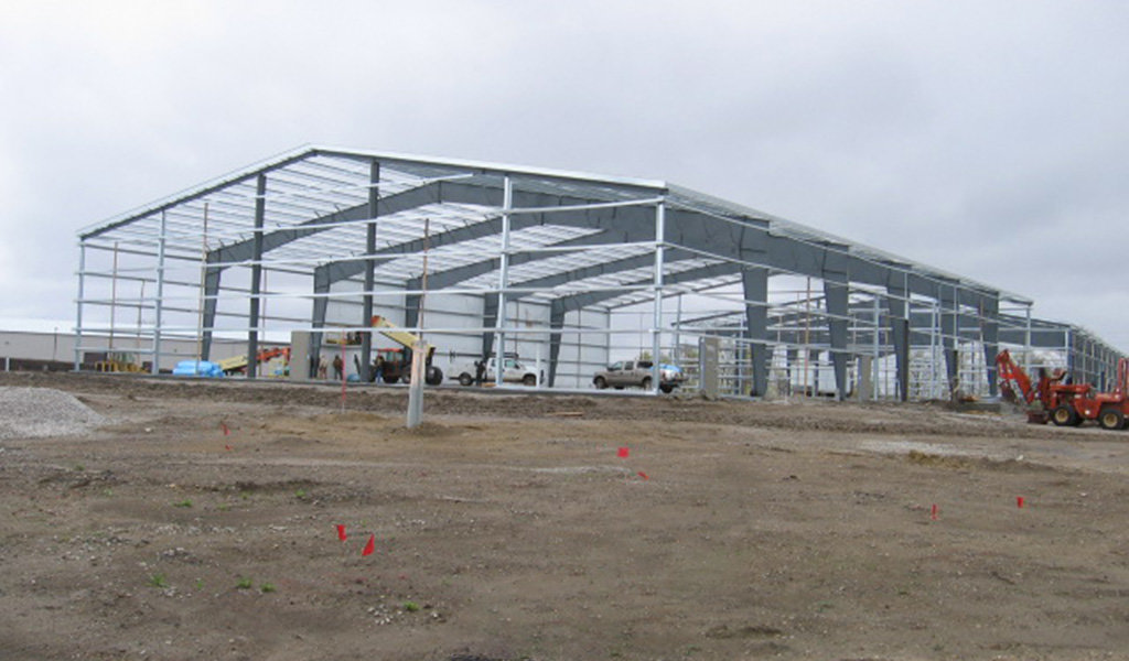Crew constructs frame of industrial building at Albaugh Industrial Park in Ankeny, IA.