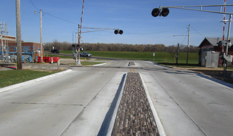 railway crossing with paved median