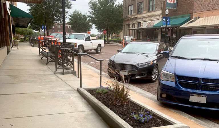 New sidewalks and decorative railings lining Stone street in Falls City, NE.