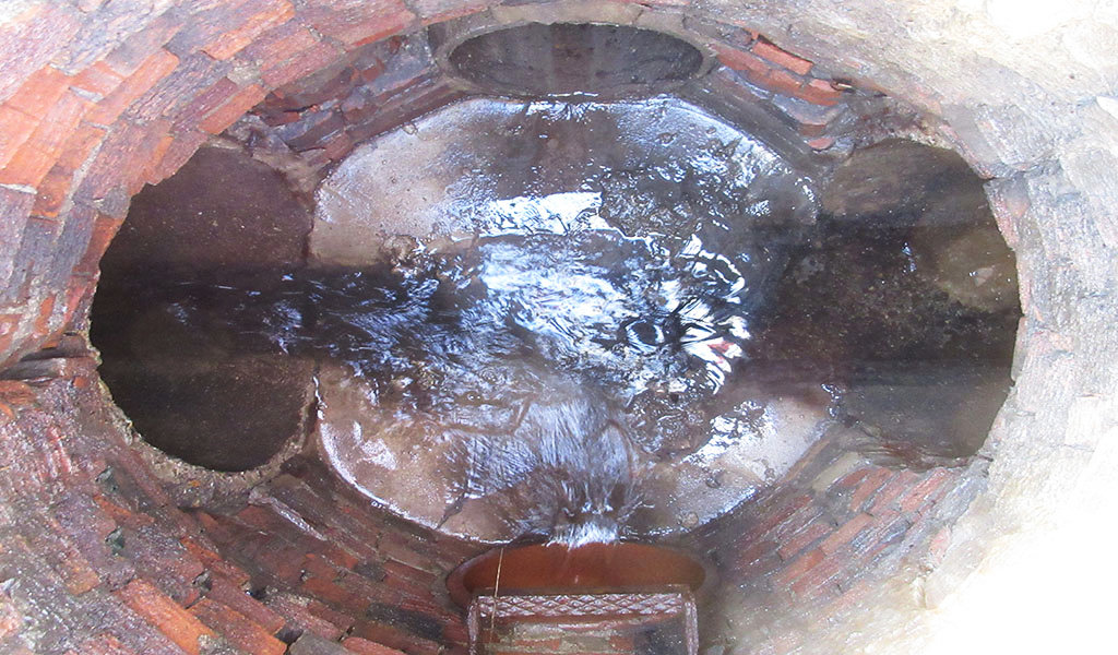 view looking down into old manhole
