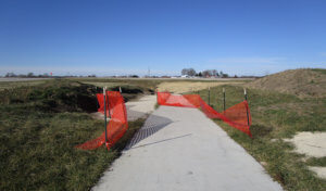 Orange contruction fencing covers trail section 
