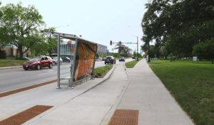 Bus stop along the road of Des Moines University