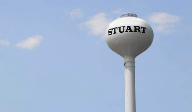 stuart water tower in front of blue sky