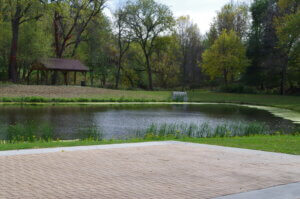 permeable paver parking lot in front of pond