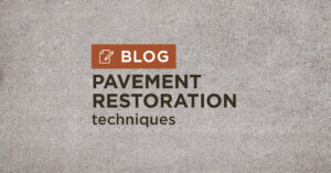 Tan gravel background with title pavement restoration techniques blog