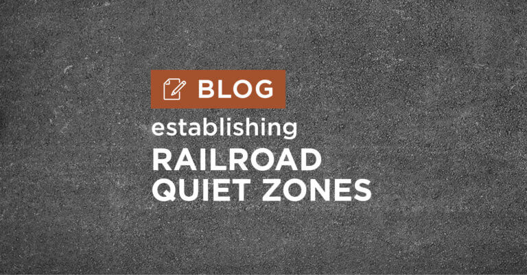 dark grey road background with title establishing railroad quiet zones