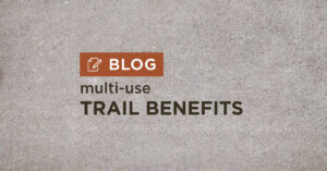 tan gravel background with title multi-use trail benefits