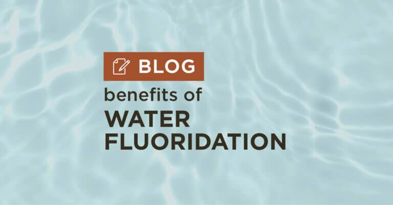 blue water background with title benefits of water fluoridation blog