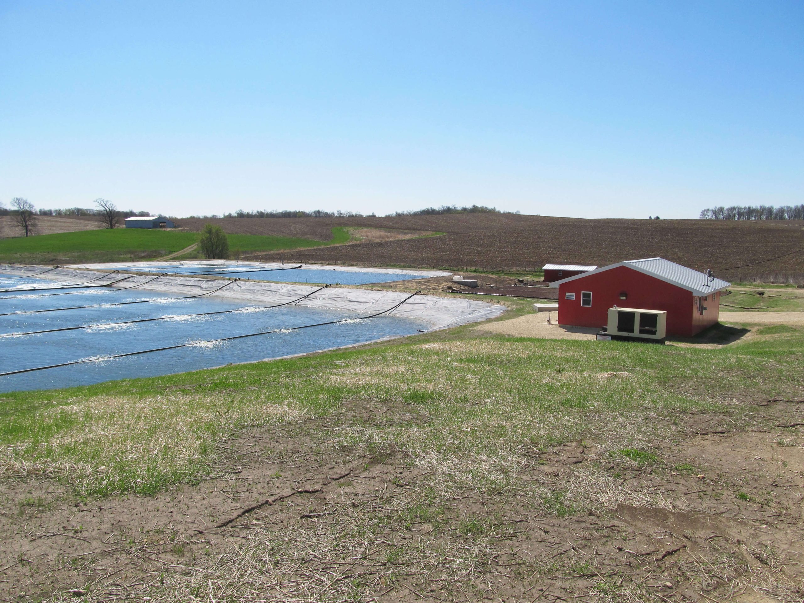 colesburg wastewater treatment plant lagoon and building