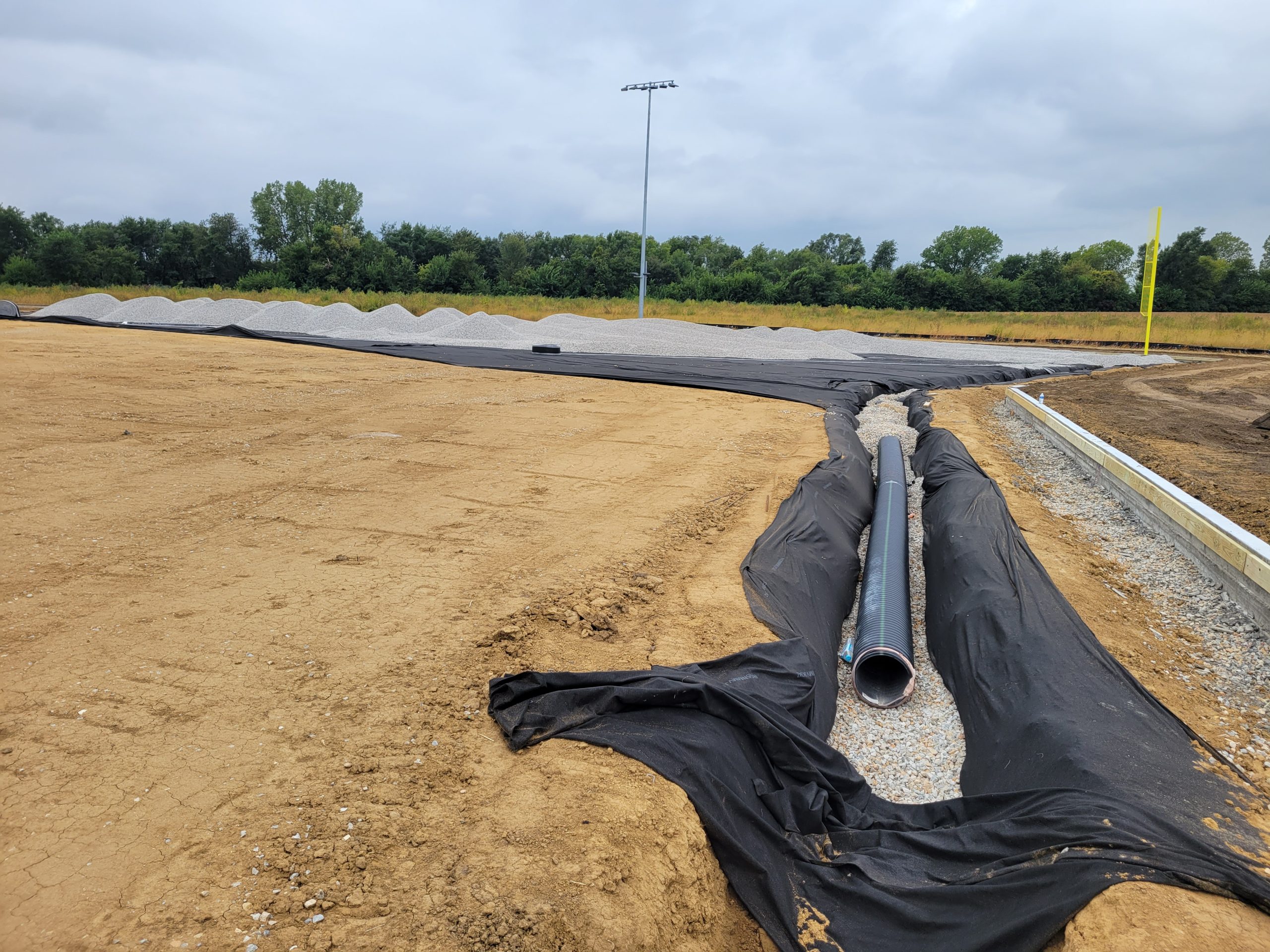 Stormwater pipe laying in ditch