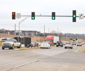 cars at a green light intersection