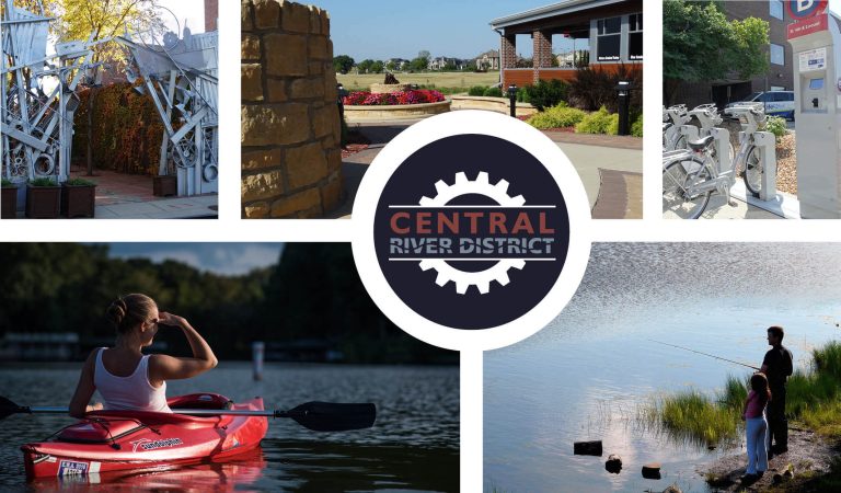 central river district master plan|central river district master plan graphic|central river district master plan key focus areas|central river district master plan planning initiatives|central river district master plan map|two men looking at a master plan display for the central river district community forum in fort dodge