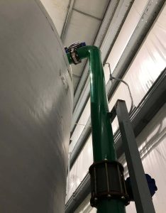 The force main enters the ethanol production facility to deliver wastewater effluent for cooling processes.