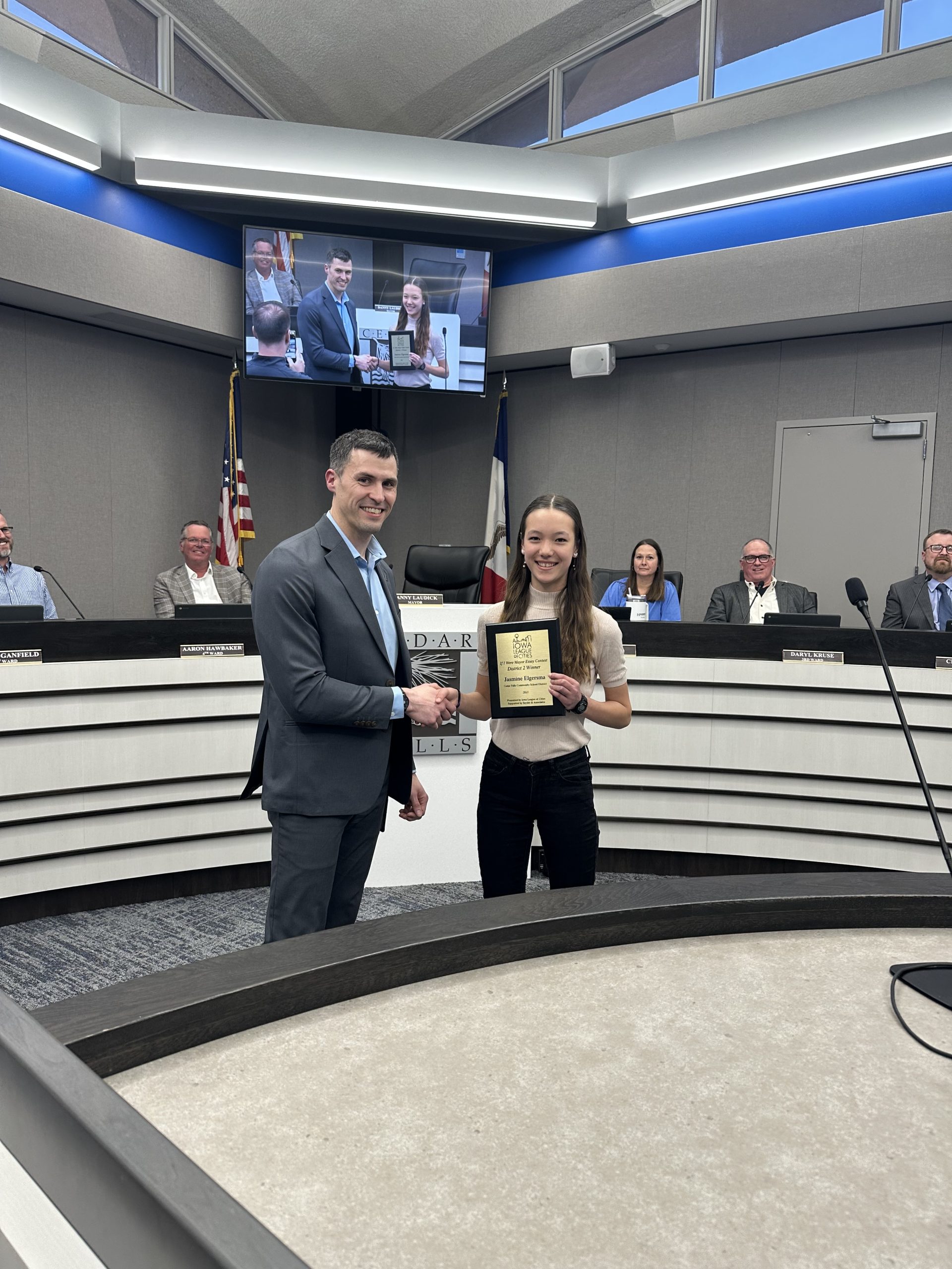 2025’s “If I Were Mayor” District 2 winner, Jasmine Elgersma holding up award