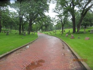 brick road running through a historic cemetery