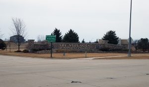 Large stone neighborhood sign
