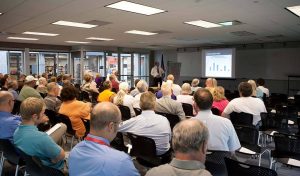 group watching a powerpoint presentation
