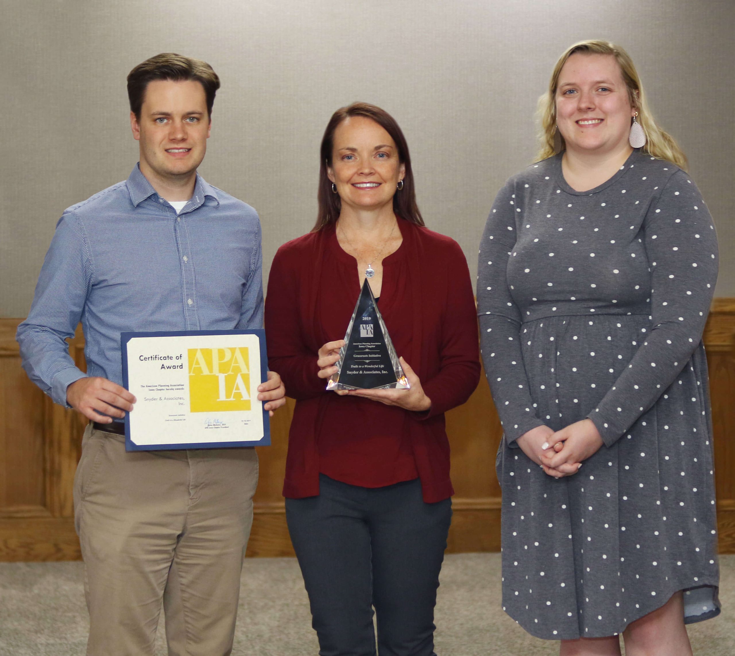 Three Snyder employees with APA award