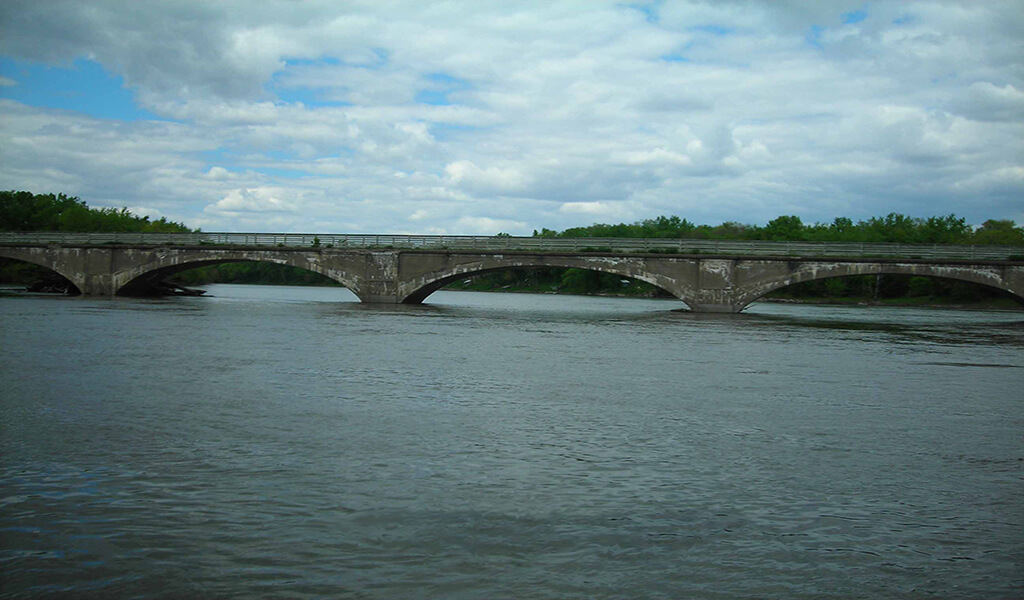 long arched bridge over river