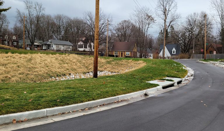 stormwater drain on street||old pipe with cracked surrounding cement|view looking through stormwater culvert|stormwater culvert|view looking down into old manhole