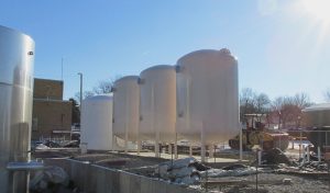 three large white tanks